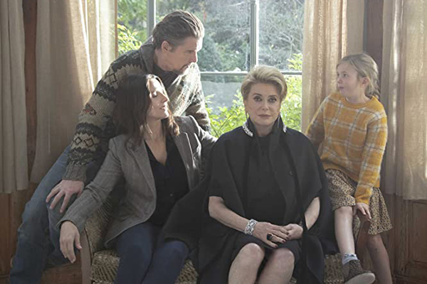 The Truth cast of Ethan Hawke, Juliette Binoche, Catherine Deneuve, Hirokazu Koreeda and Clémentine Grenier sit on a couch