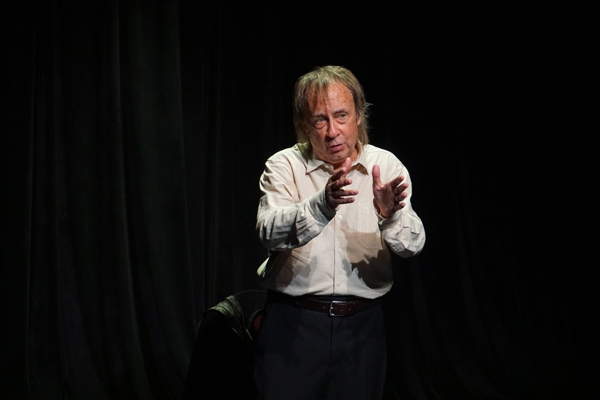 Joe Hanrahan in a scene from The Midnight Company production of 'Here Lies Henry,' a one-act, one actor show by Daniel MacIvor; photo by Joey Rumpell.